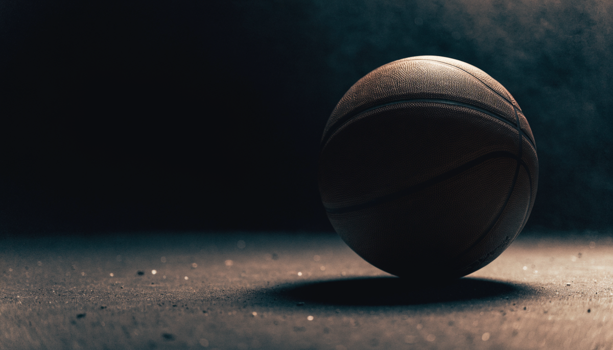 Basketball on a dark textured floor